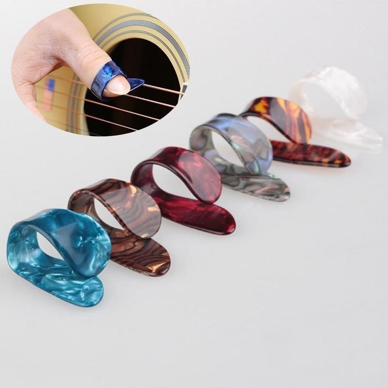 Lote de 4 púas para el pulgar de colores aleatorios