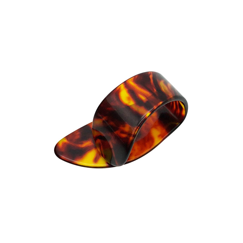 Púa de pulgar para guitarras acústicas, eléctricas o bajos - grosor 1.2mm - color ámbar