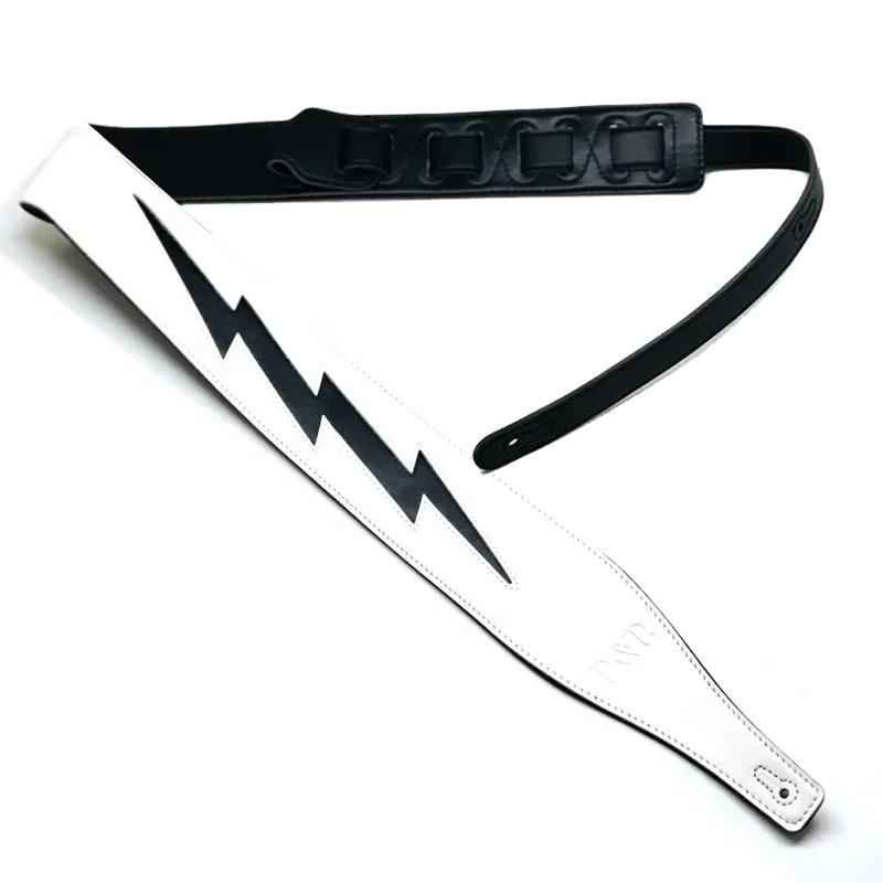 Correa de guitarra de cuero con diseño icónico de rayo en negro sobre blanco
