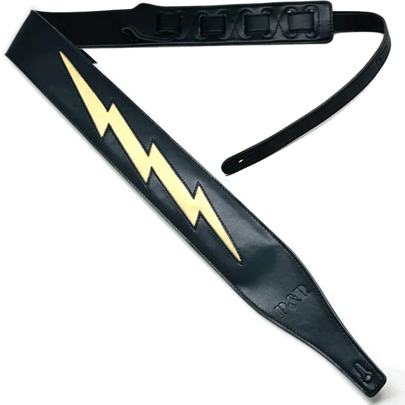 Correa de guitarra de cuero con icónico diseño de rayo amarillo sobre negro