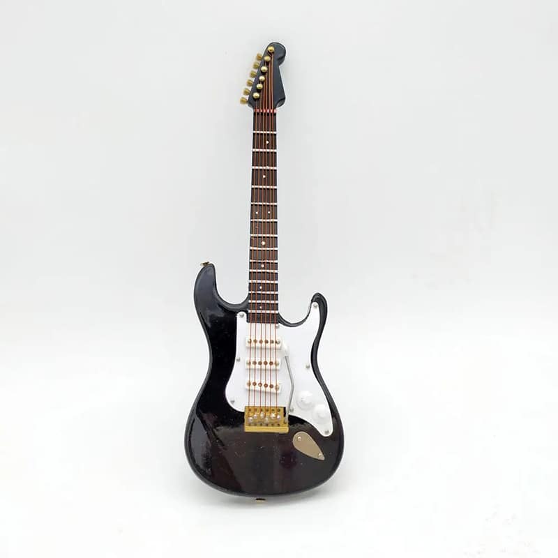 vista frontal de una guitarra eléctrica en miniatura a escala 1-6