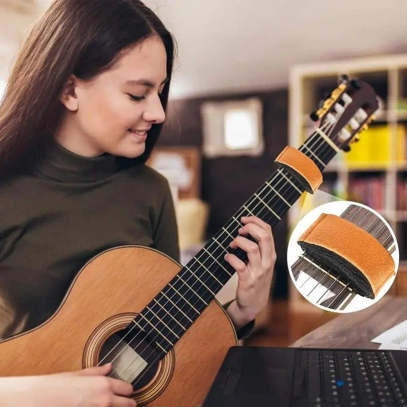 Amortiguador silencioso de cuerdas de guitarra de color marrón