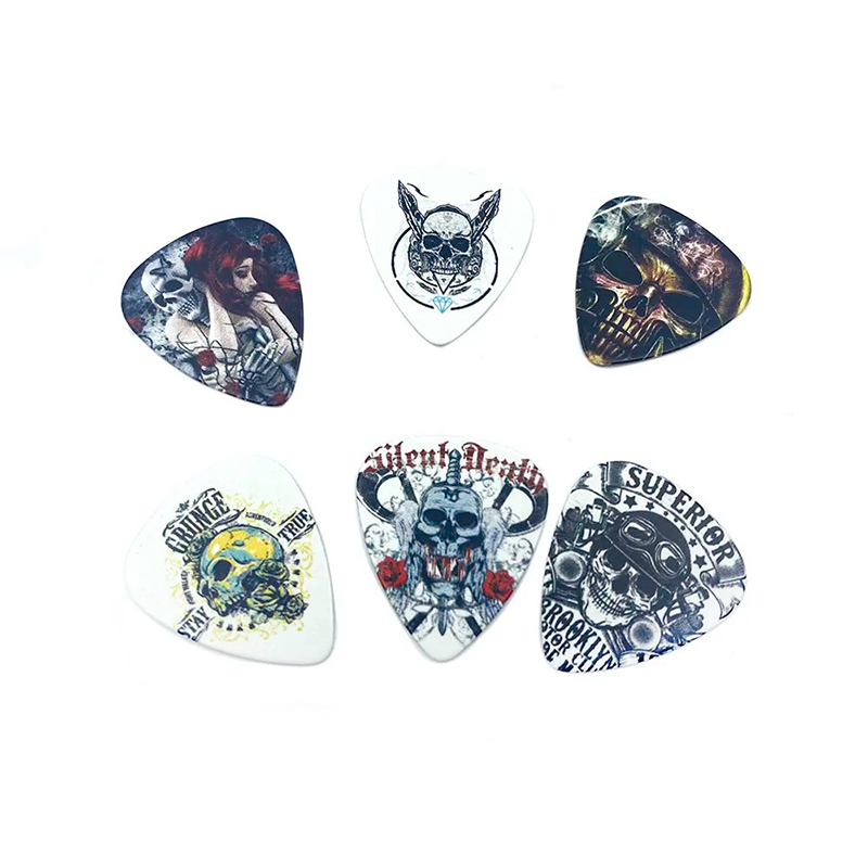 ejemplos de púas de la caja de metal con un lote de 12 púas con diseños de Death Metal