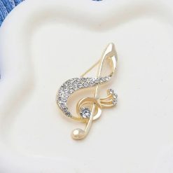 Broche Clf en forma de Sol adornada con Strass