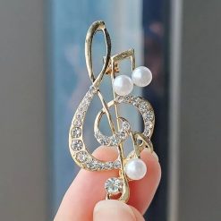 Broche de Clave de Sol adornada con Strass y perlas