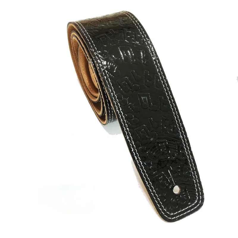 Correa de guitarra de cuero con patrones de notas musicales de color negro