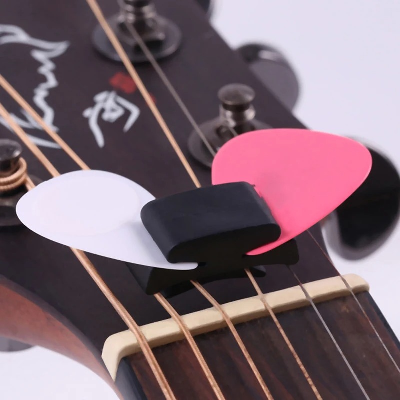detalles del Soporte para Púas en la Cabeza de la Guitarra