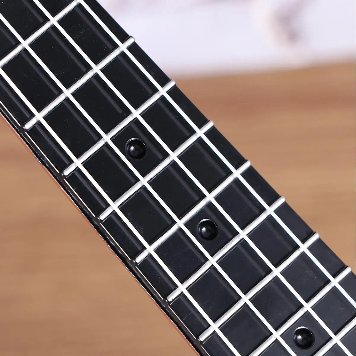 Detalles de las cuerdas del ukelele para niños, instrumento perfecto para los más pequeños