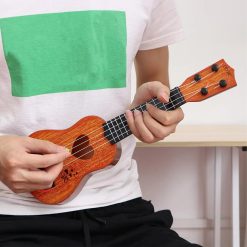 Detalles de las cuerdas del ukelele para niños, instrumento perfecto para los más pequeños
