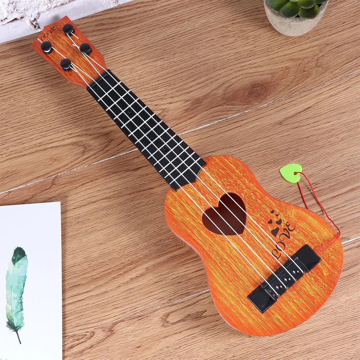 Detalles de las cuerdas del ukelele para niños, instrumento perfecto para los más pequeños