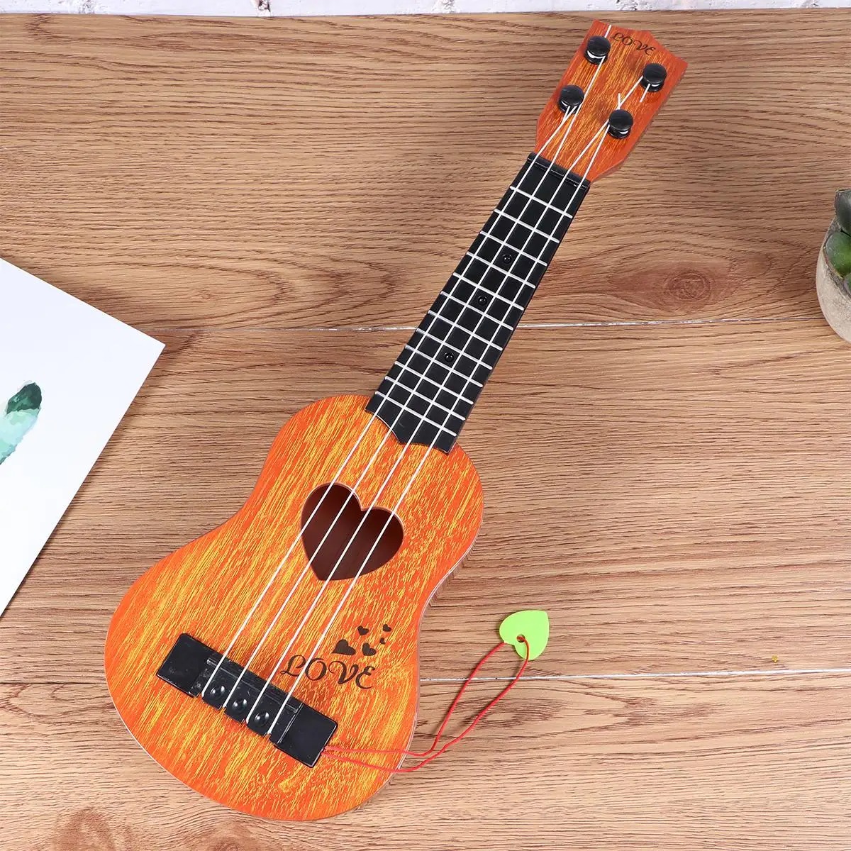 Detalles de las cuerdas del ukelele para niños, instrumento perfecto para los más pequeños