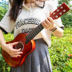 Vista general de la guitarra para niños de 63 cm - Color café profundo
