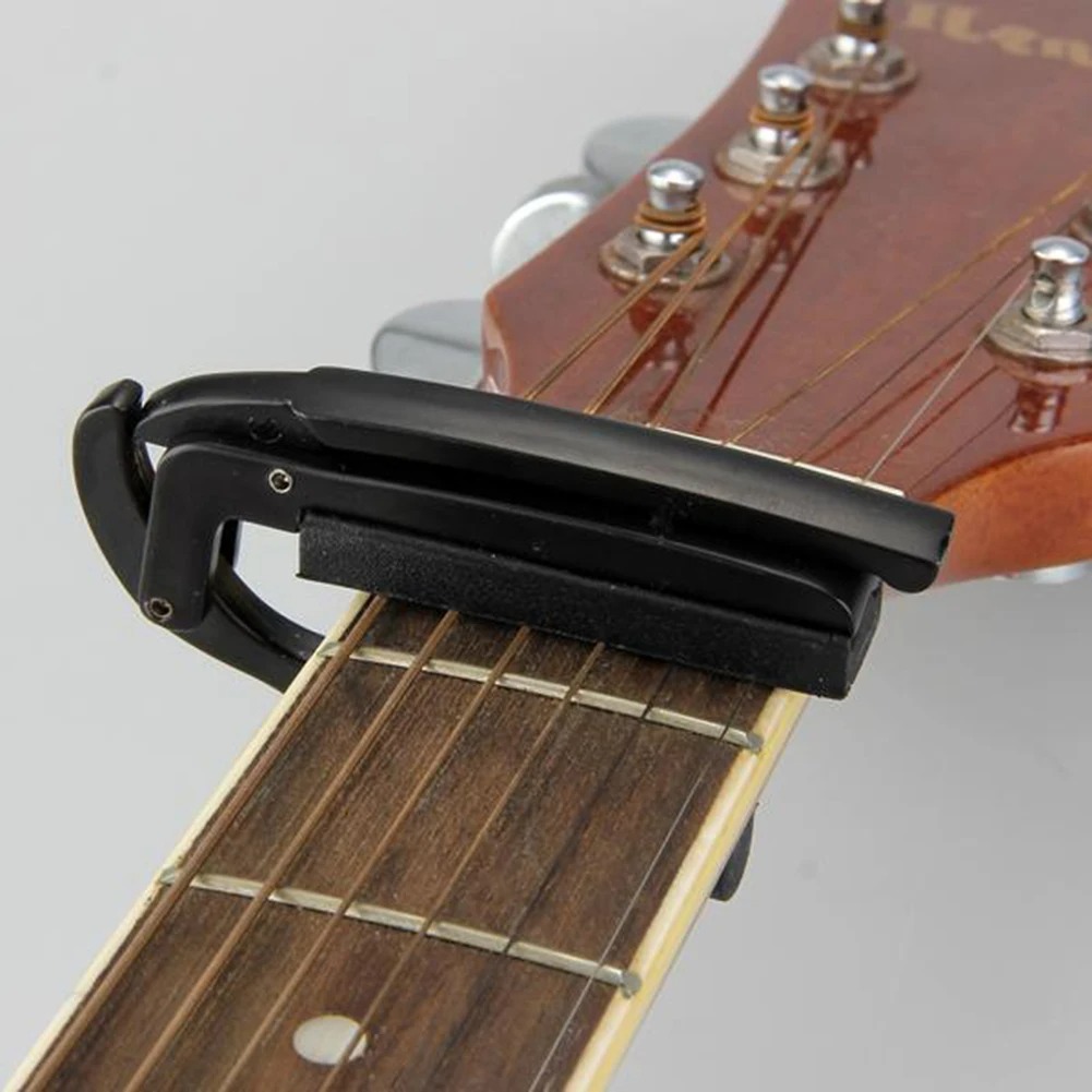 Magnífico Capo de Guitarra Modelo Mini Abrazadera Flexible