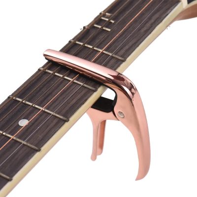 Vista general de la Cejilla de Guitarra Universal de Metal - Colores Premium (Negro, Oro, Plata, Oro Rosa)