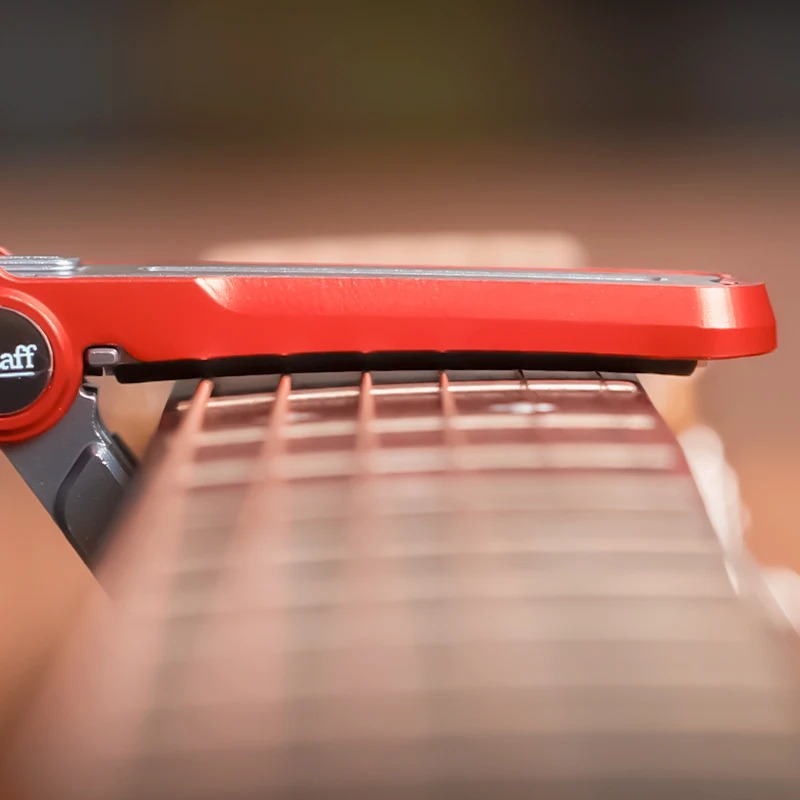 Capodastre Guitare Premium Réglable avec Système de Pression - Contrôlée et Glissière Fluide