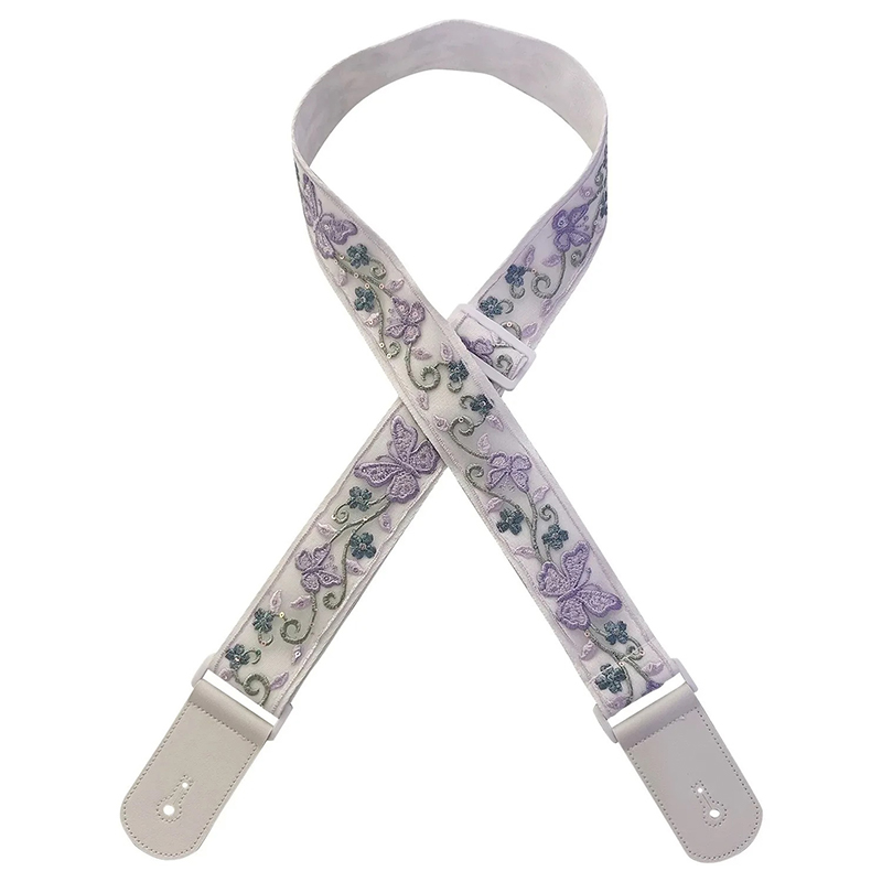 Sangle de guitare ivoire avec motifs de papillons lavande et embouts en cuir PU beige.