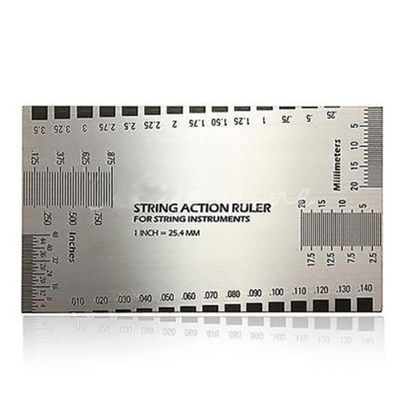 Règle de mesure pour cordes de guitare électrique