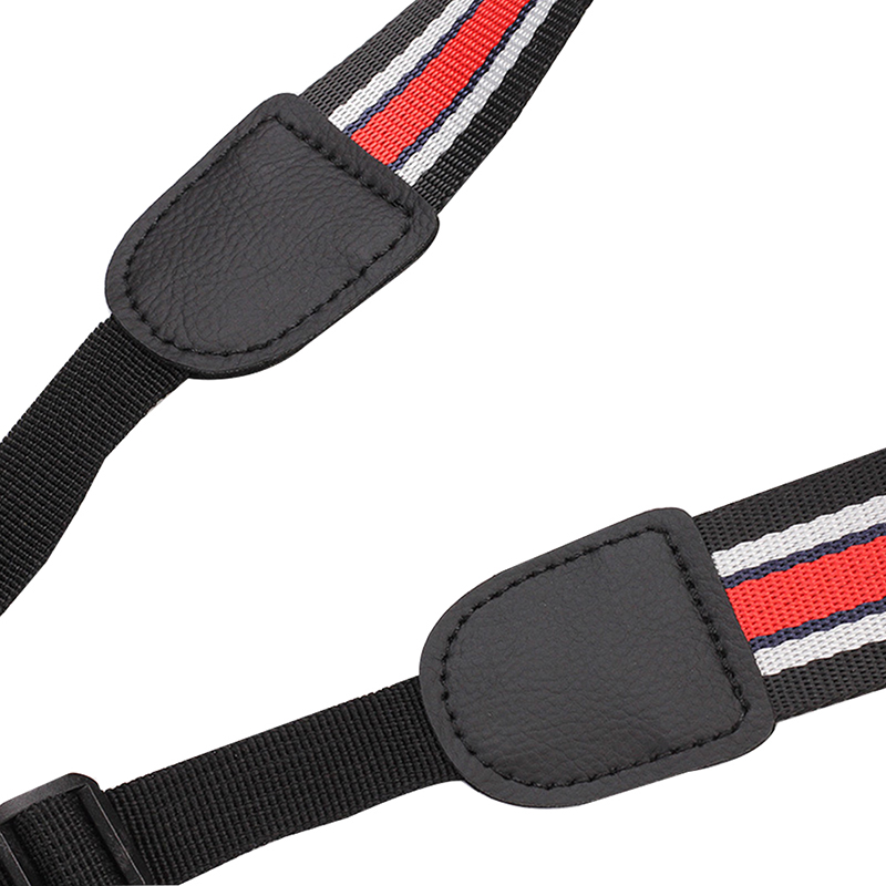 détails coutures sangle de cou pour ukulélé de couleur noir